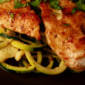 3 pieces of low carb chicken piccata, served on a bed of zoodles - zucchini noodles.