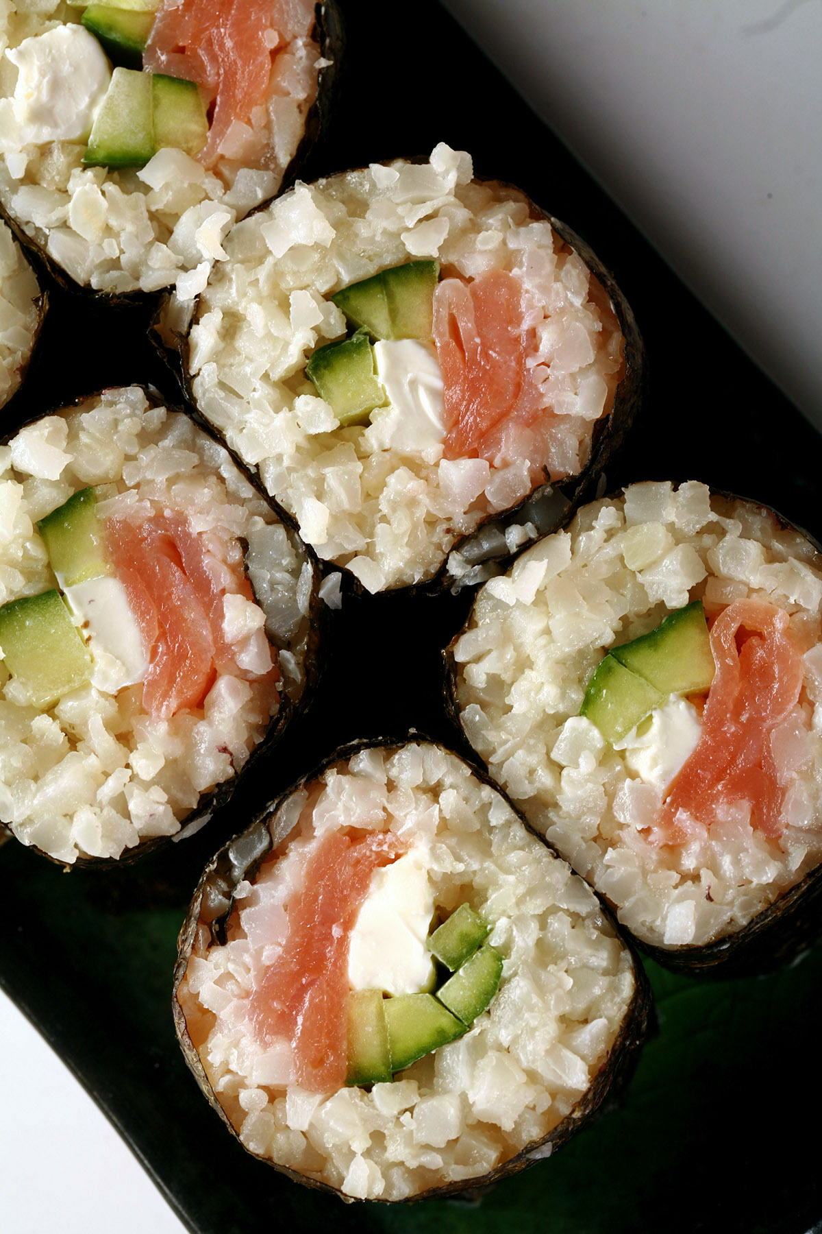 A close up view of a philly roll made from keto sushi rice.