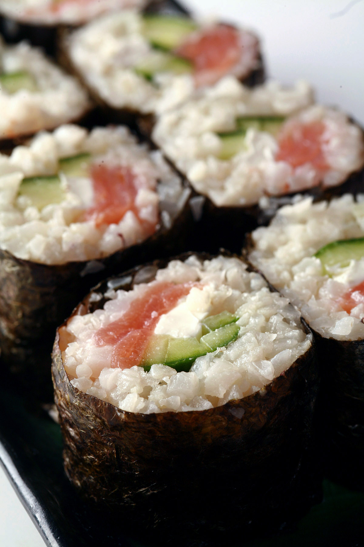 A close up view of a philly roll made from low carb sushi rice.