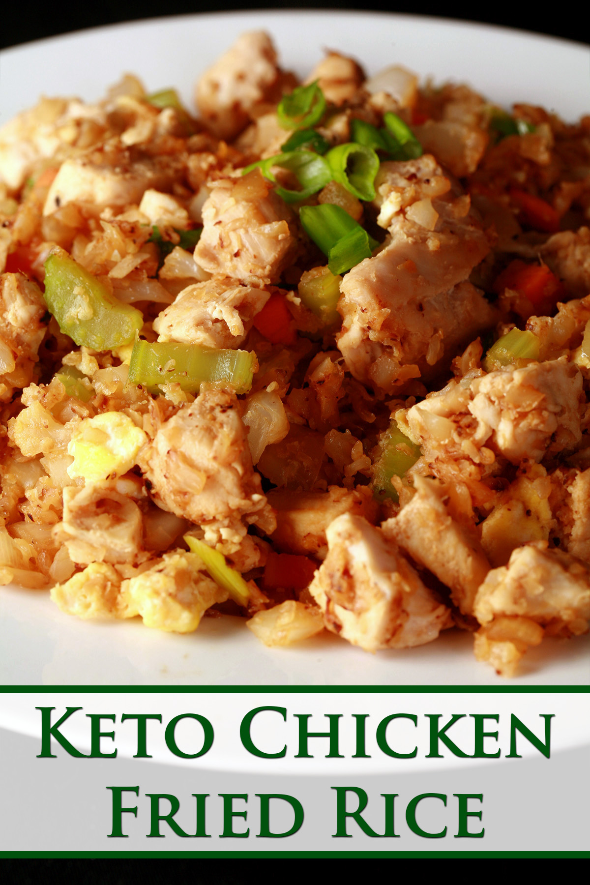 A heaping serving of keto chicken fried rice, in a white bowl.