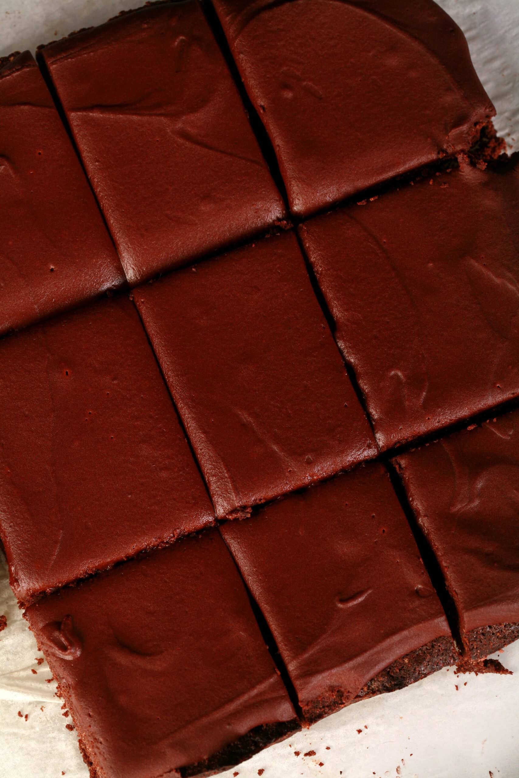 A slab of keto brownies, cut into bars.
