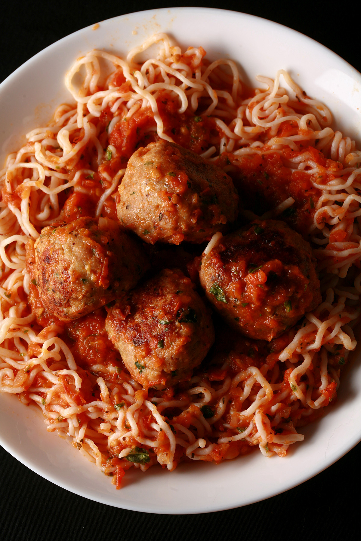 A plate of low carb spaghetti and meatballs.