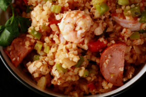 A close up photo of a bowl of keto jambalaya with shrimp and sausage.