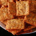 A bowl full of low carb crackers.