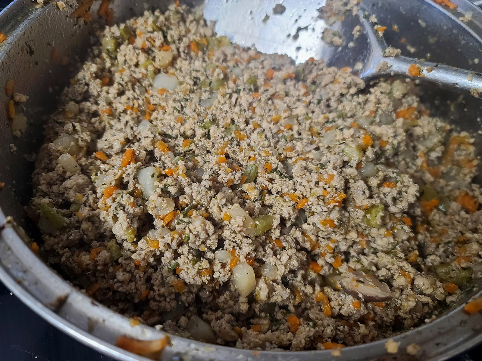 A close up photo of the finished meat pie filling.