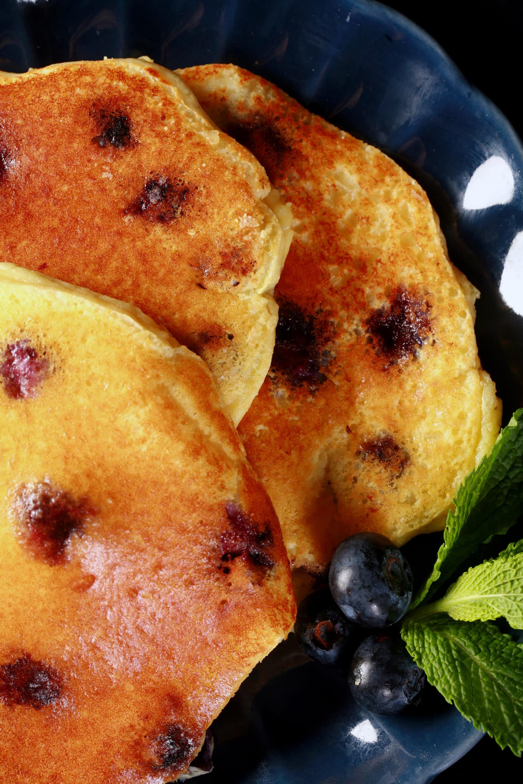 A plate of keto blueberry protein pancakes.