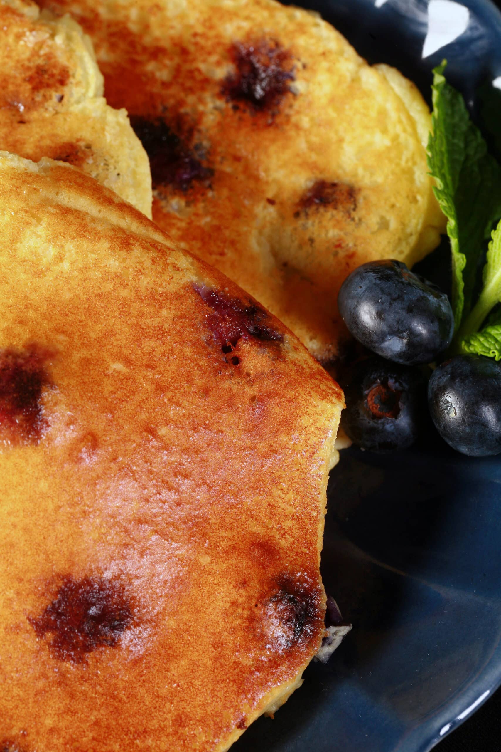 A plate of low carb blueberry pancakes.