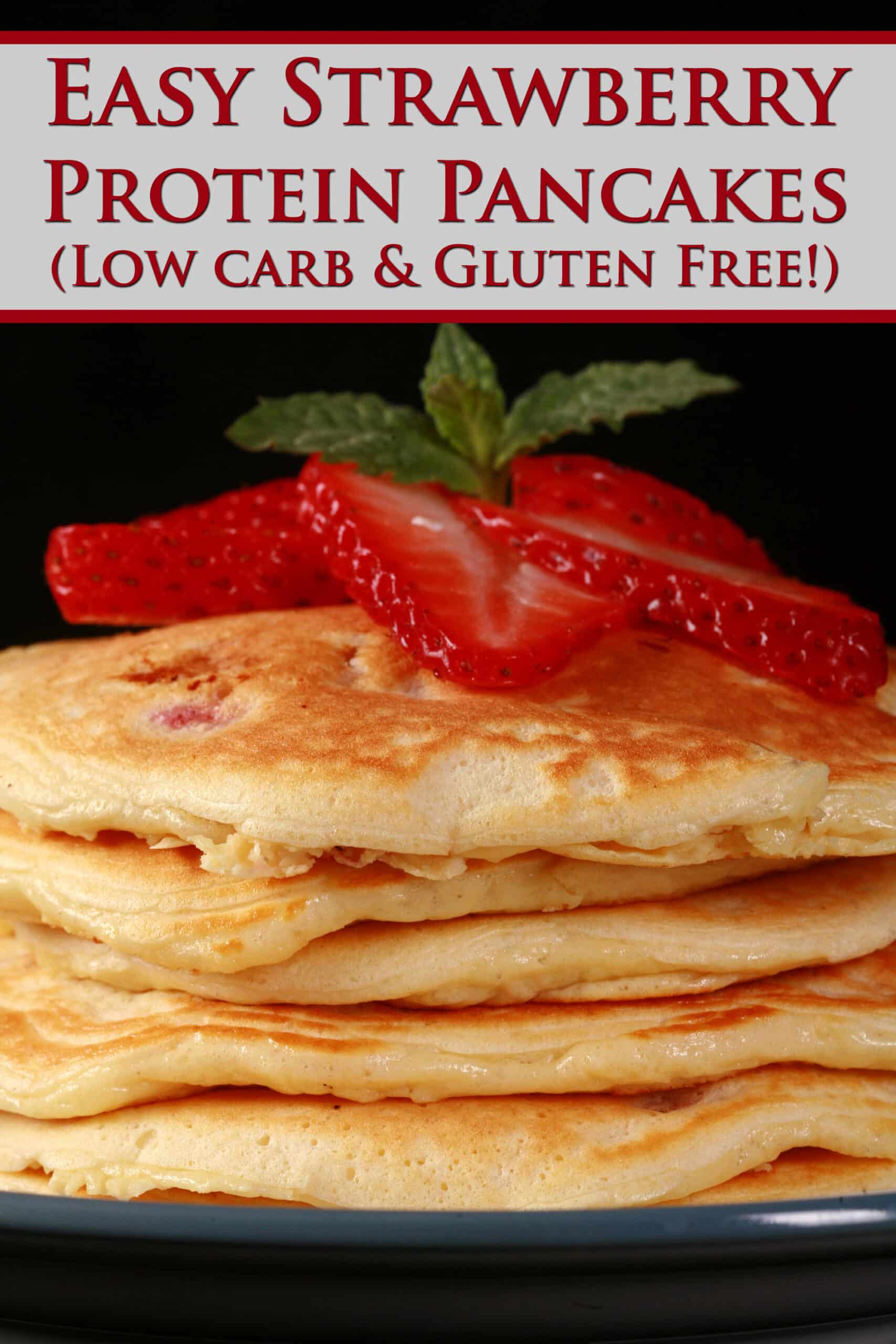 A stack of keto strawberry pancakes topped with sliced strawberries and mint. Red text says easy strawberry protein pancakes, low carb and gluten free.