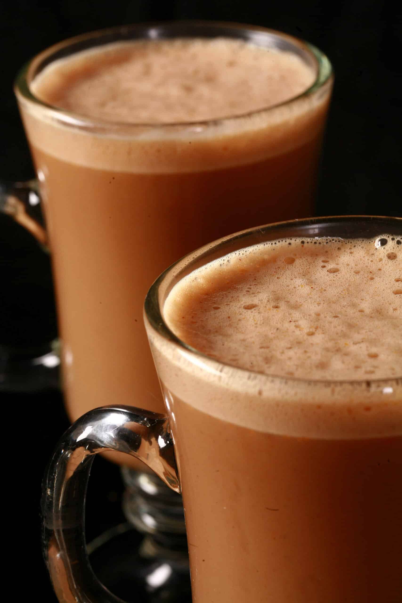 2 mugs of high protein keto pumpkin spice latte.