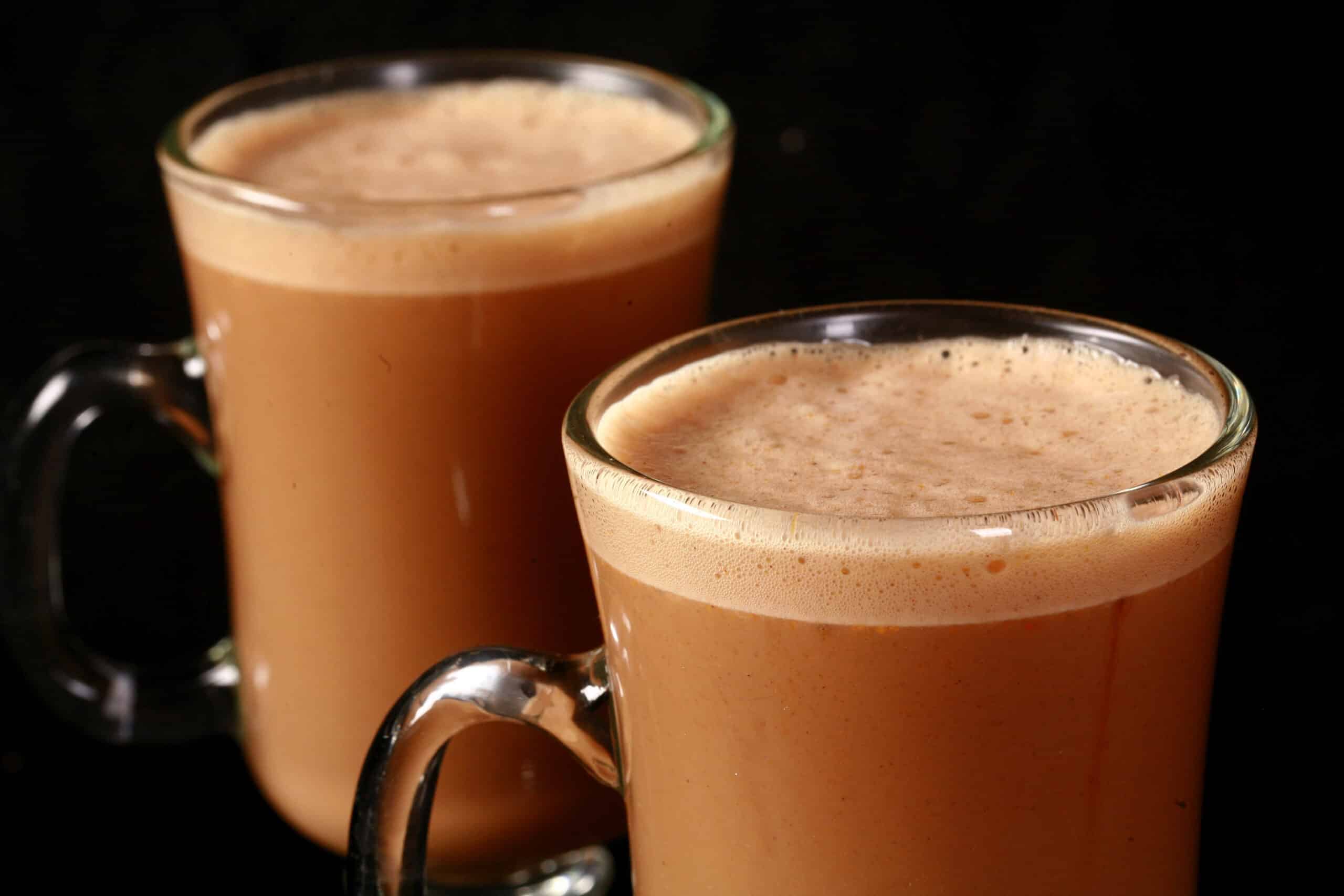 2 mugs of high protein keto pumpkin spice latte.