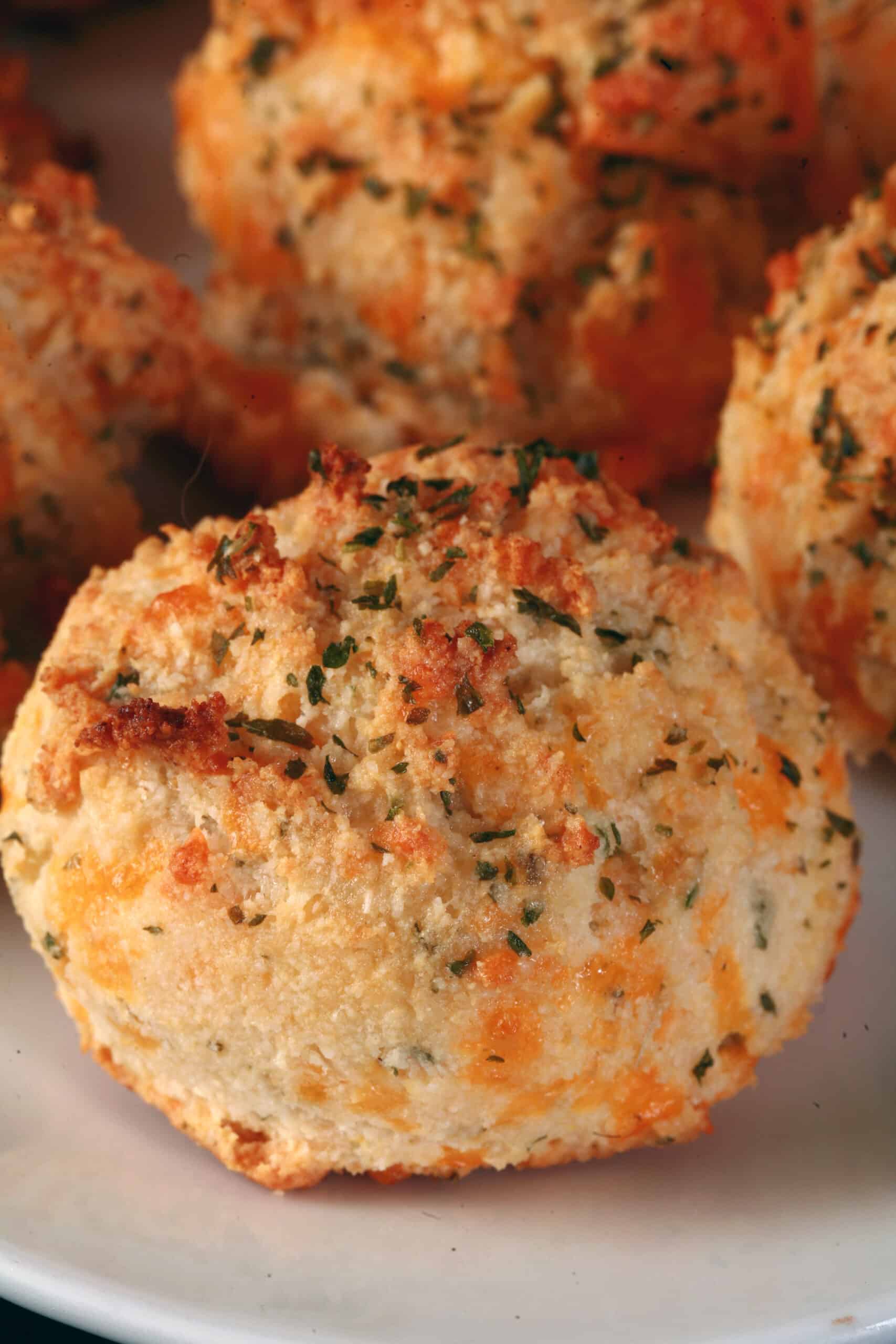 A plate of cheesy keto cheddar bay biscuits.