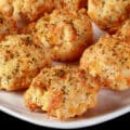 A plate of cheesy keto cheddar biscuits.