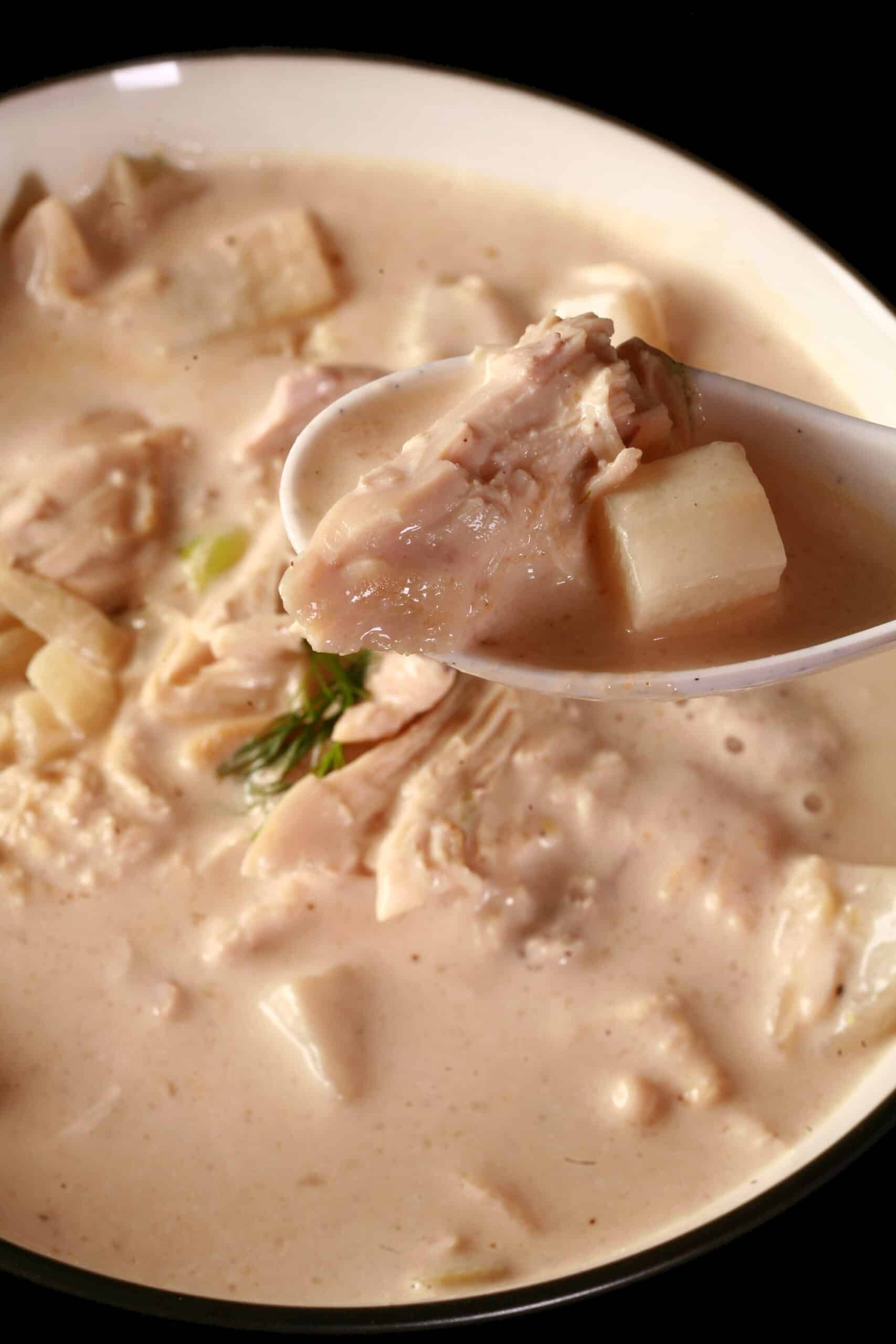 A bowl of creamy keto fennel chicken soup.