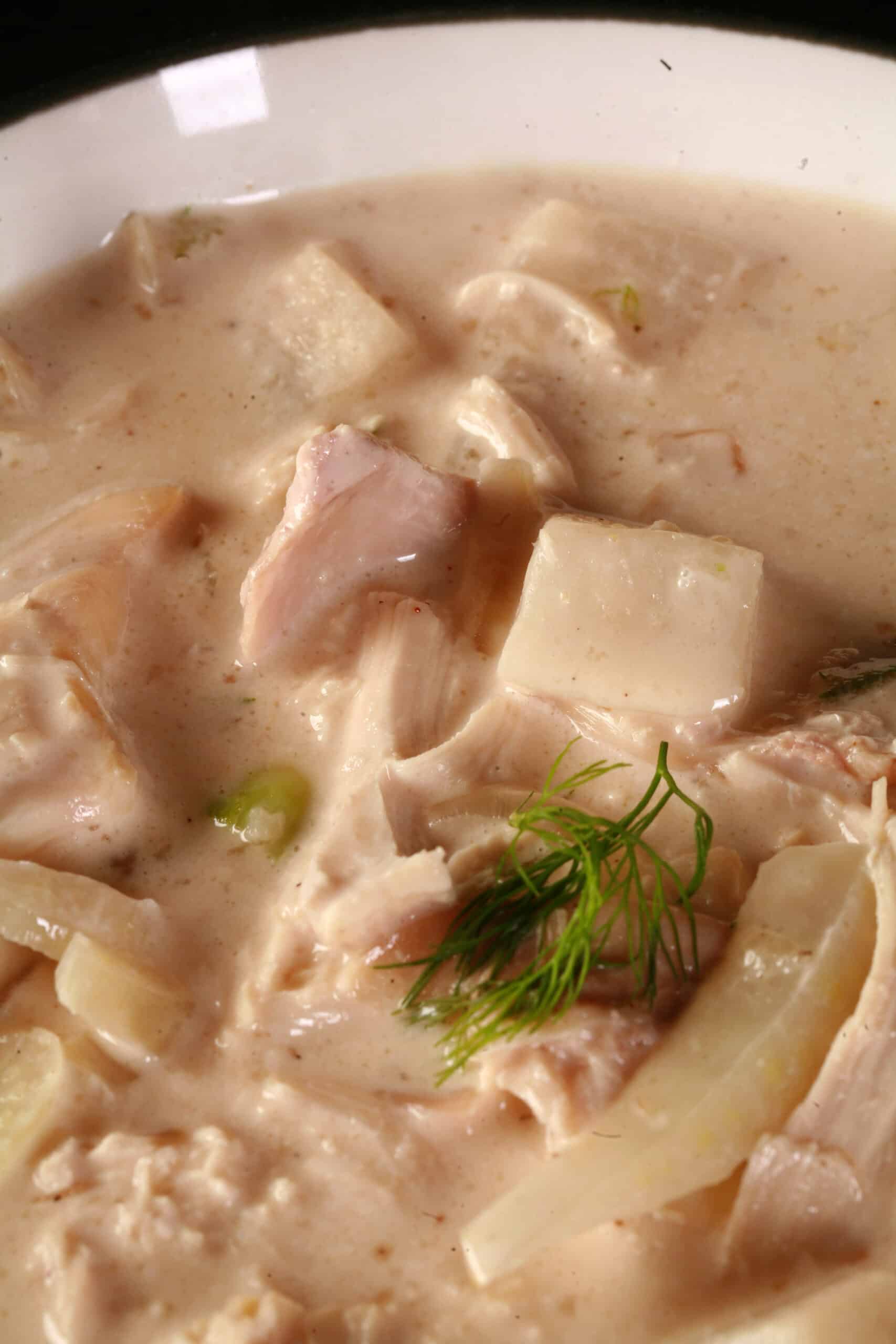 A bowl of creamy keto fennel chicken soup.