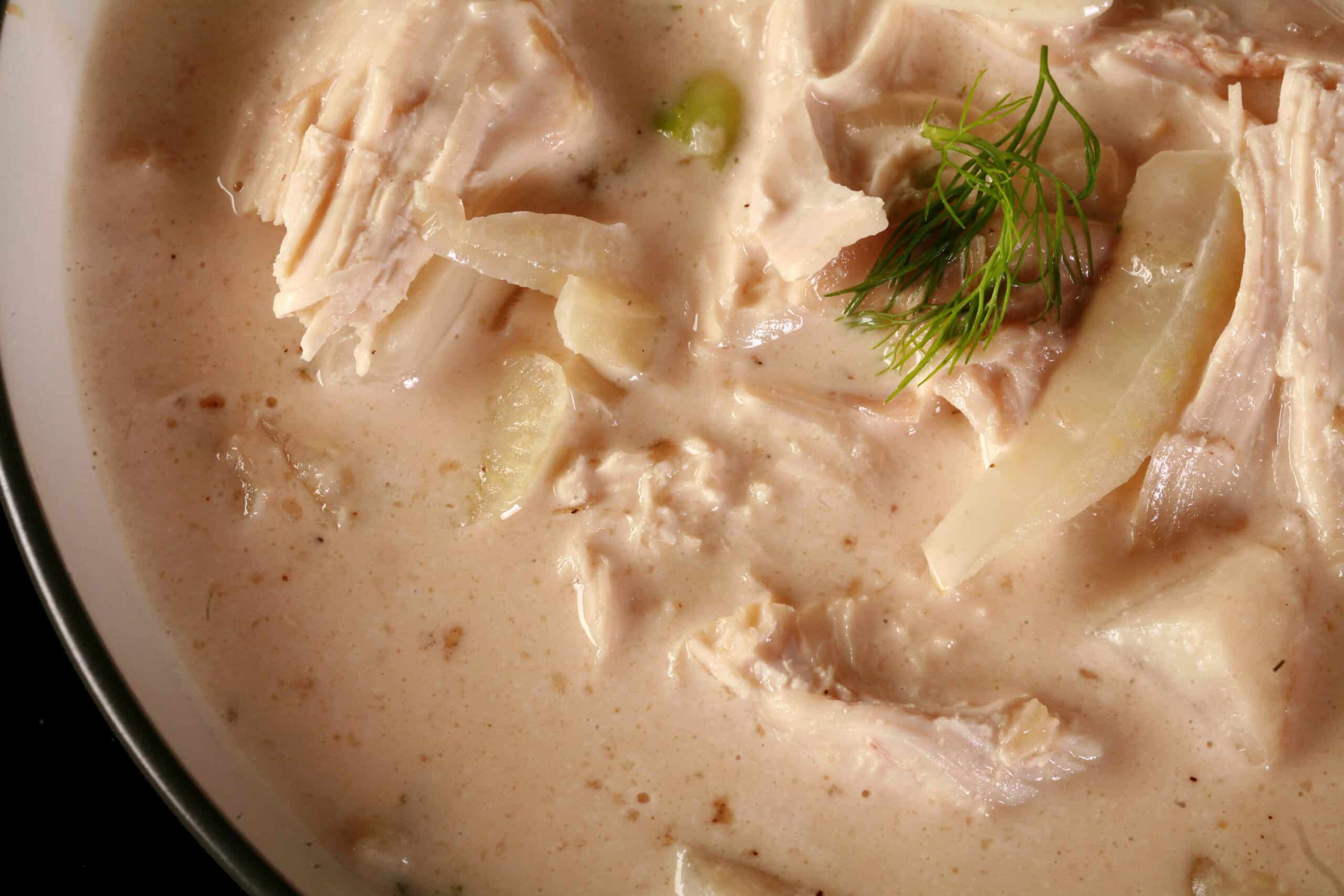 A bowl of creamy keto fennel chicken soup.