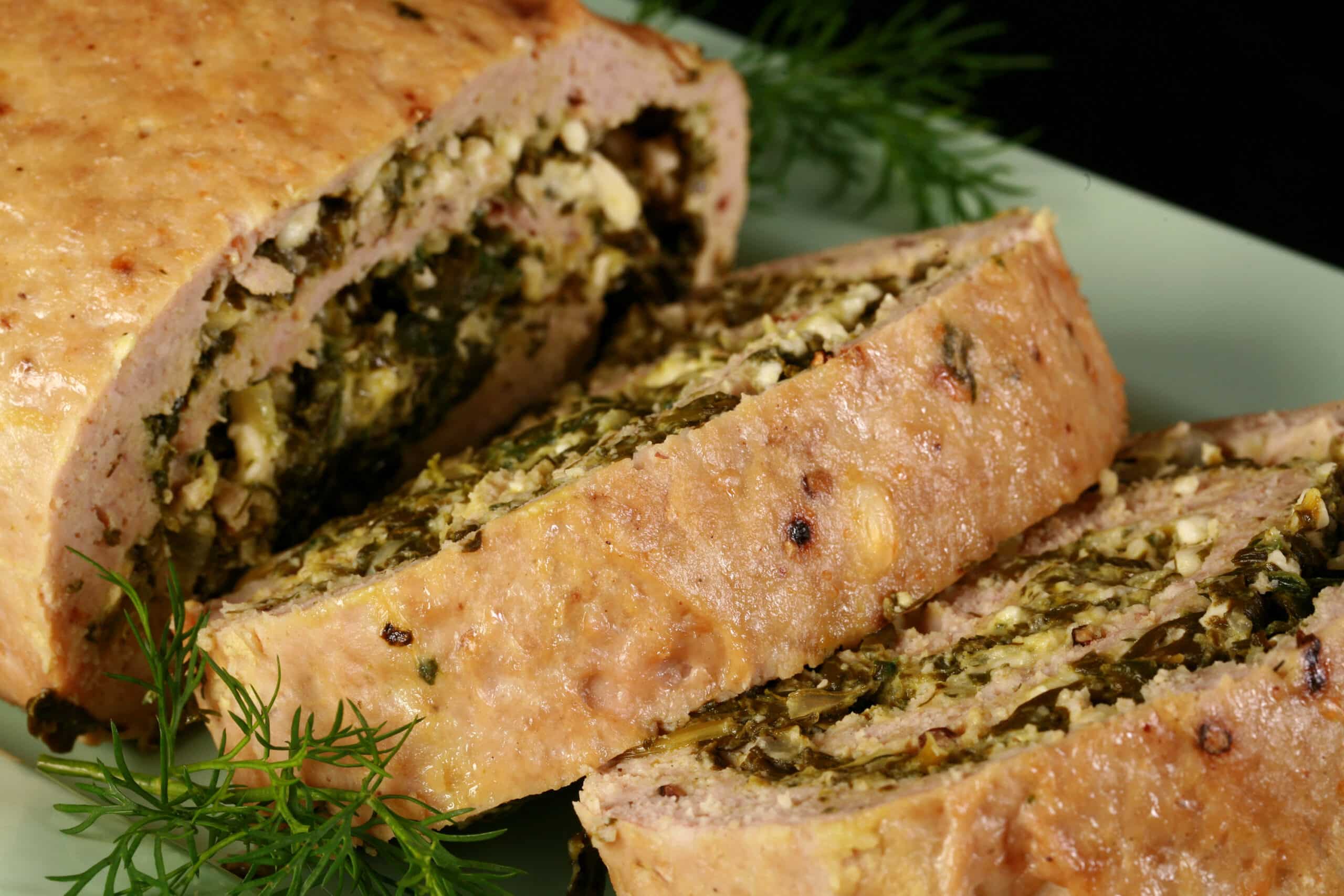 A rolled Spanakopita stuffed meatloaf.