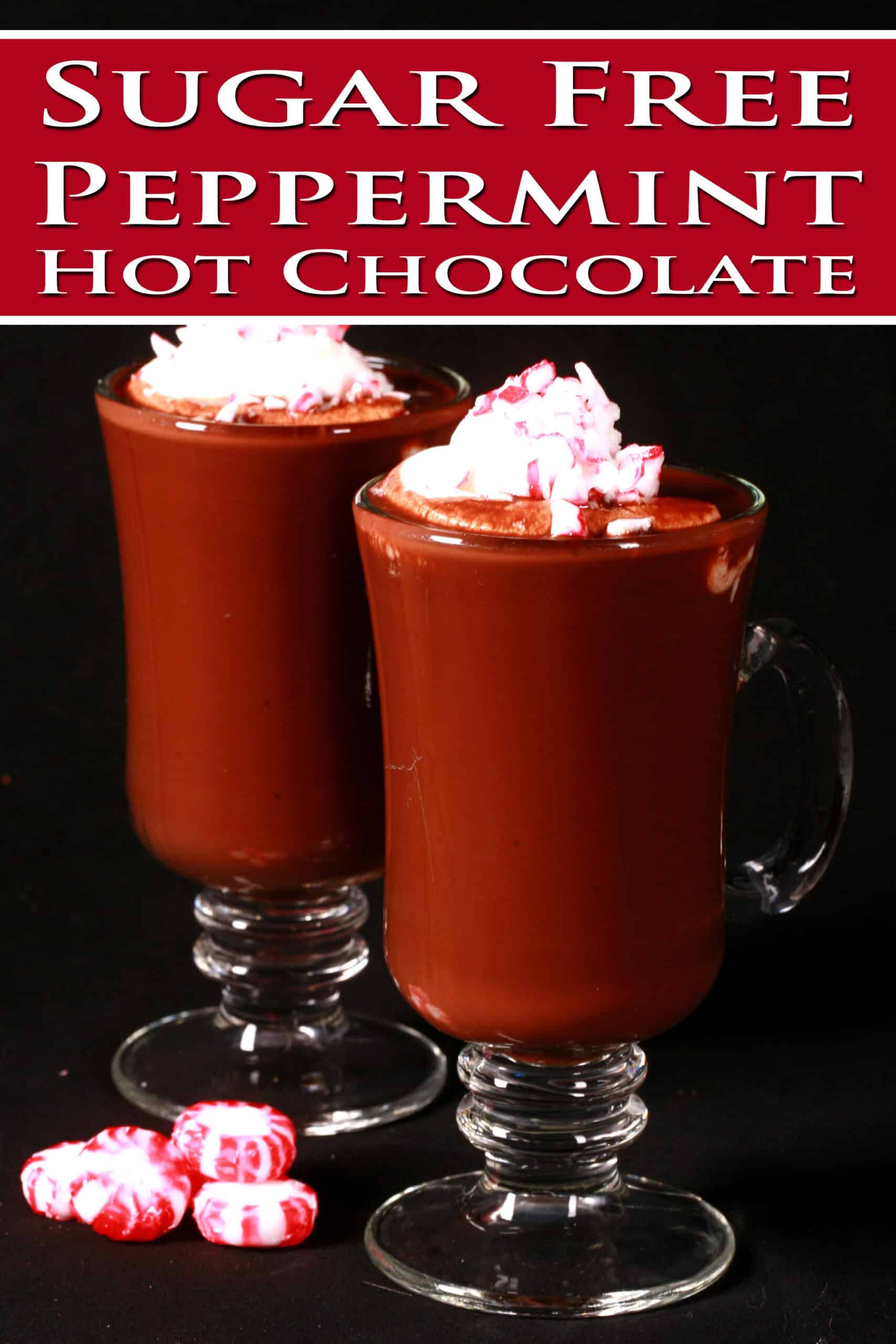 2 glass mugs of keto peppermint hot cocoa topped with whipped cream and crushed sugar free peppermint candies.  Overlaid text says sugar free hot chocolate.