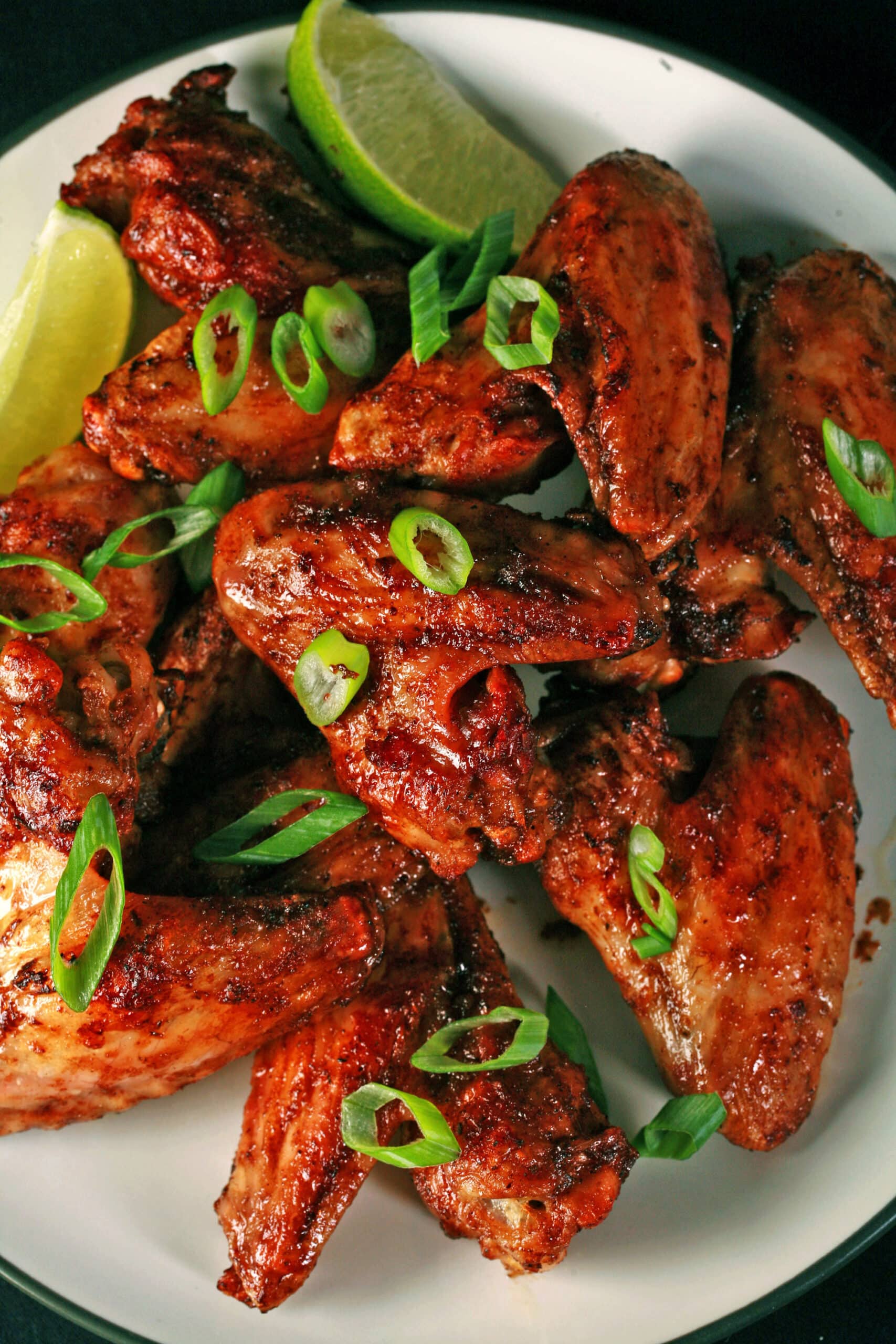 A plate of air fryer jamaican  jerk wings.