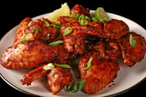 A plate of air fried jerk chicken wings.