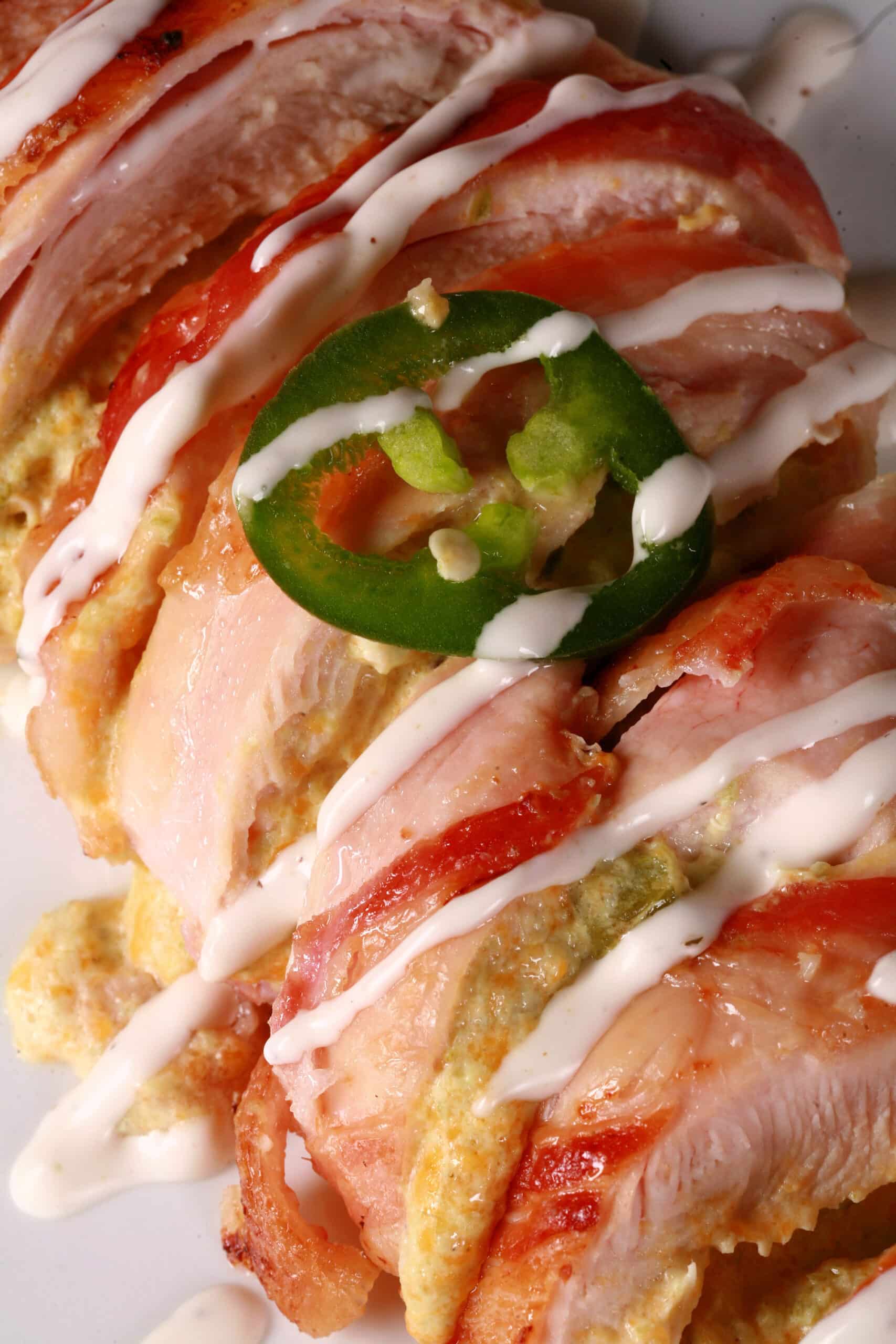 A plate of Jalapeno popper stuffed chicken breasts.