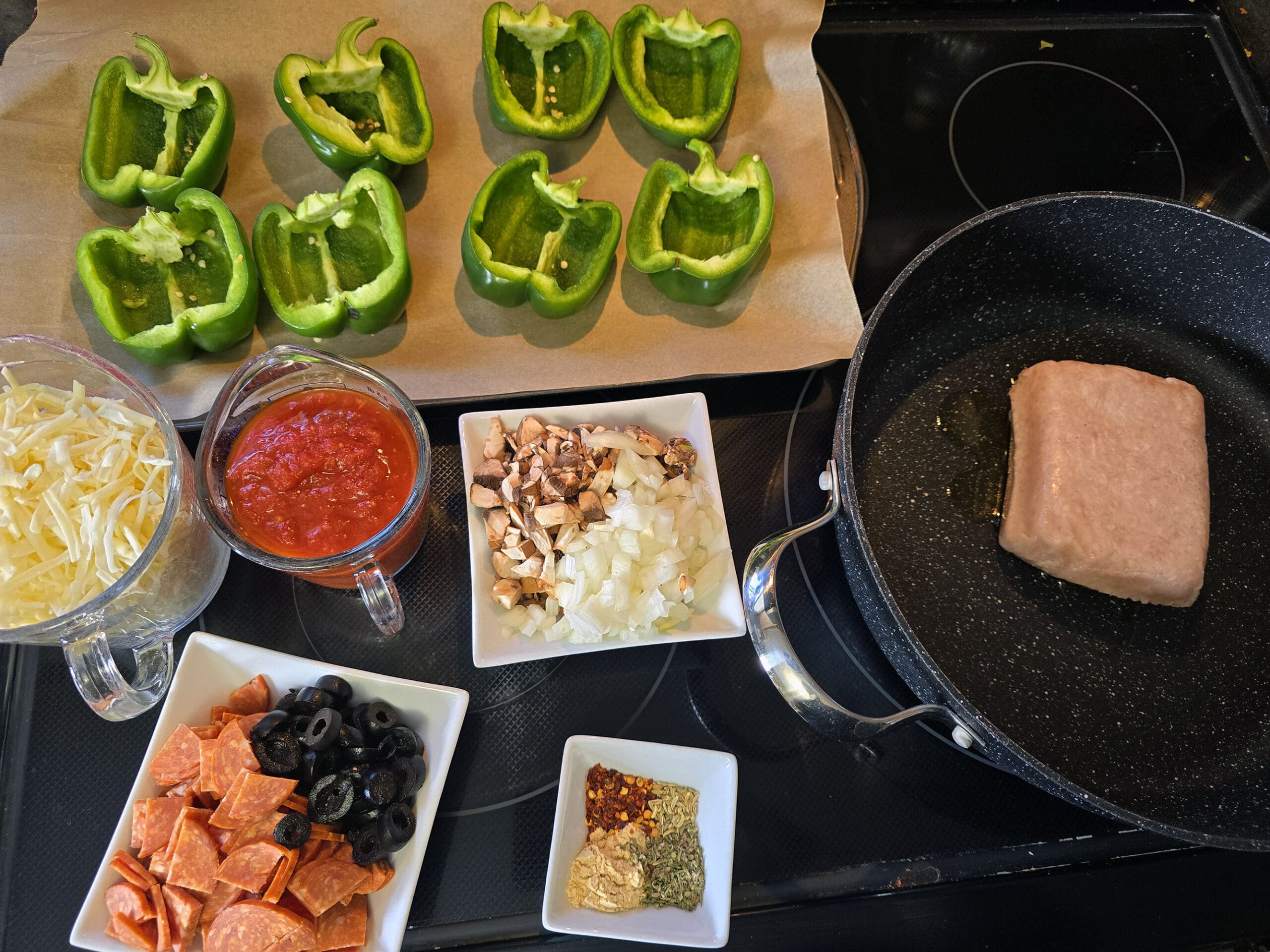 All of the prepared ingredients laid out on the stove top