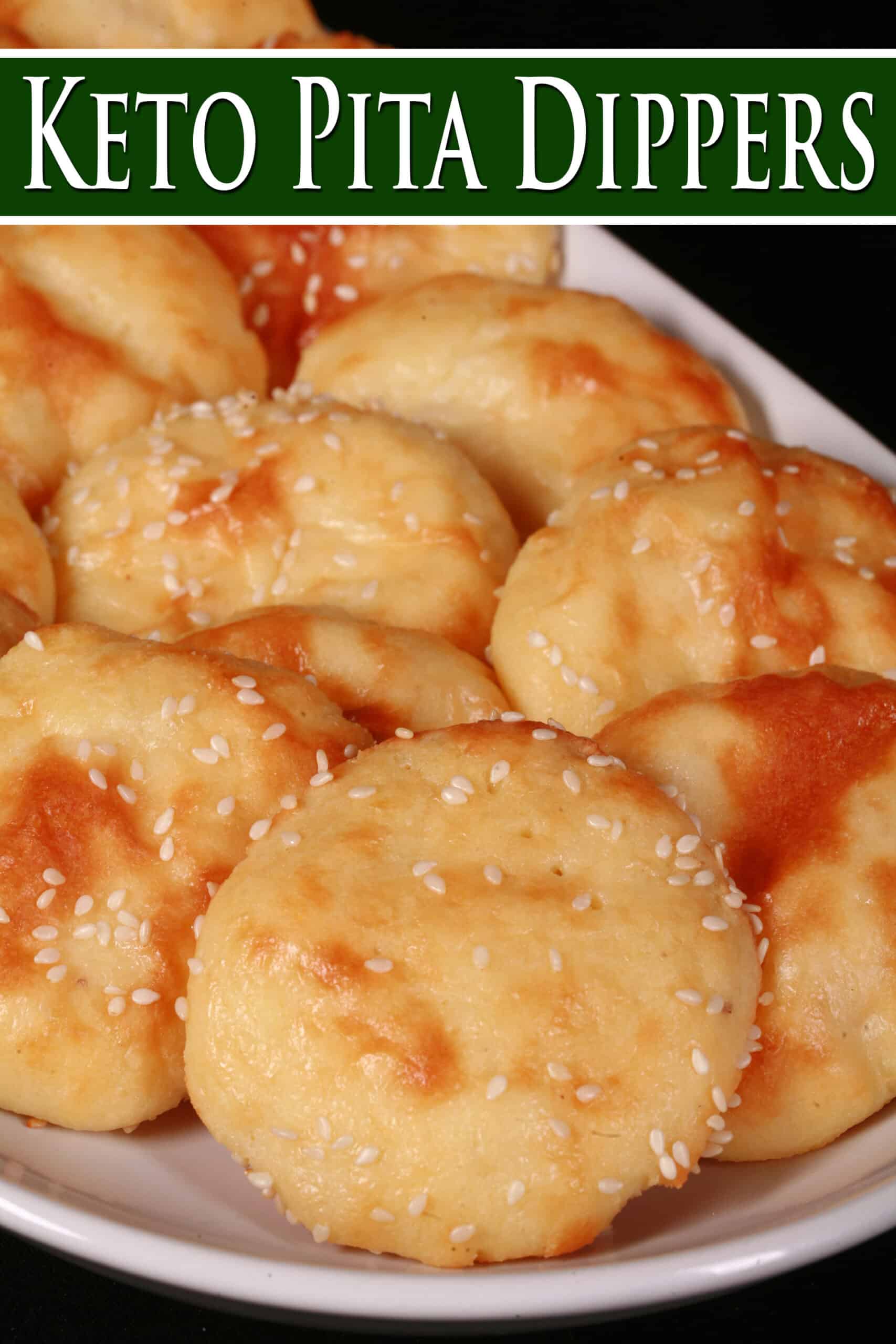 A plate of baked fathead dough rounds with sesame seeds. Overlaid text says keto pita dippers.