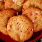 Several keto white chocolate peppermint cookies on a plate.